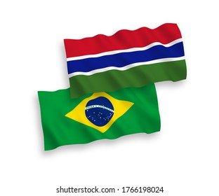 National vector fabric wave flags of Brazil and Republic of Gambia isolated on white background. 1 to 2 proportion.