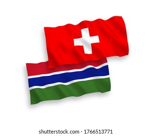 National vector fabric wave flags of Republic of Gambia and Switzerland isolated on white background. 1 to 2 proportion.