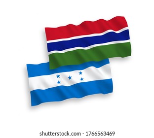 National vector fabric wave flags of Republic of Gambia and Honduras isolated on white background. 1 to 2 proportion.