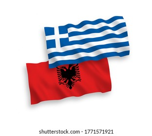 National vector fabric wave flags of Greece and Albania isolated on white background. 1 to 2 proportion.