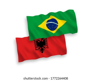 Nationale Vektor-Wellen-Flaggen von Brasilien und Albanien einzeln auf weißem Hintergrund. 1 bis 2 %.