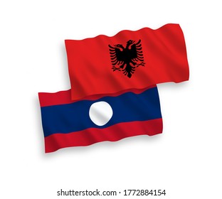 National vector fabric wave flags of Albania and Laos isolated on white background. 1 to 2 proportion.