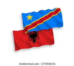 National vector fabric wave flags of Albania and Democratic Republic of the Congo isolated on white background. 1 to 2 proportion.