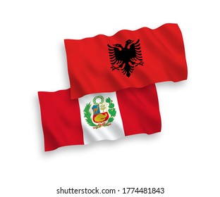 National vector fabric wave flags of Albania and Peru isolated on white background. 1 to 2 proportion.