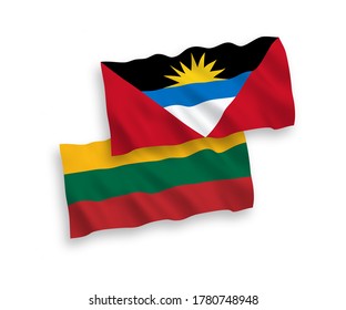 National vector fabric wave flags of Lithuania and Antigua and Barbuda isolated on white background. 1 to 2 proportion.