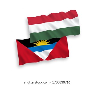 Nationale Vektor-Wellen-Flaggen von Antigua und Barbuda und Ungarn einzeln auf weißem Hintergrund. 1 bis 2 %.