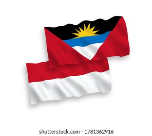 Nationale Vektorgrafik-Wellenflags von Indonesien und Antigua und Barbuda einzeln auf weißem Hintergrund. 1 bis 2 %.