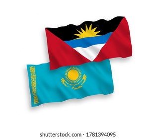 National vector fabric wave flags of Kazakhstan and Antigua and Barbuda isolated on white background. 1 to 2 proportion.