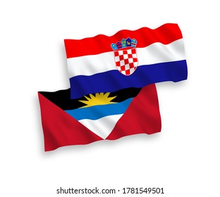 National vector fabric wave flags of Antigua and Barbuda and Croatia isolated on white background. 1 to 2 proportion.