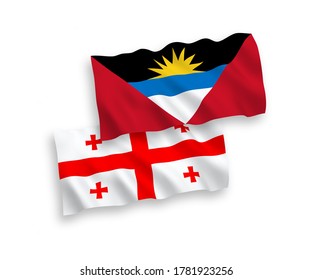 Nationale Vektor-Wellen-Flaggen von Antigua und Barbuda und Georgien einzeln auf weißem Hintergrund. 1 bis 2 %.