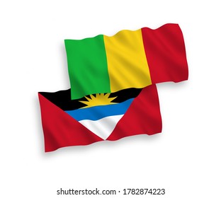 National vector fabric wave flags of Antigua and Barbuda and Mali isolated on white background. 1 to 2 proportion.