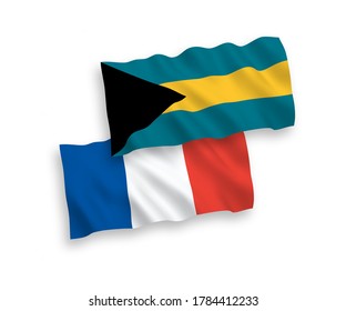 National vector fabric wave flags of France and Commonwealth of The Bahamas isolated on white background. 1 to 2 proportion.