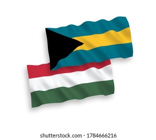 Banderas de olas de tela vectorial nacional de la Commonwealth de las Bahamas y Hungría aisladas en fondo blanco. de 1 a 2.