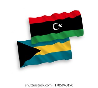 Banderas de olas de tela vectorial nacional de la Commonwealth de las Bahamas y Libia aisladas en fondo blanco. de 1 a 2.