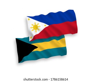National vector fabric wave flags of Commonwealth of The Bahamas and Philippines isolated on white background. 1 to 2 proportion.