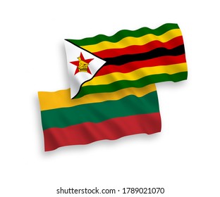 National vector fabric wave flags of Lithuania and Zimbabwe isolated on white background. 1 to 2 proportion.