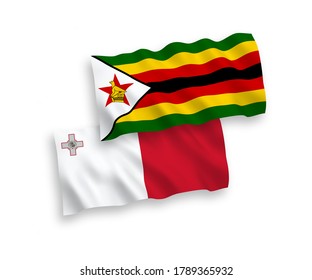National vector fabric wave flags of Malta and Zimbabwe isolated on white background. 1 to 2 proportion.
