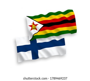 National vector fabric wave flags of Finland and Zimbabwe isolated on white background. 1 to 2 proportion.