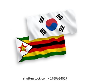 Nationale Vektor-Wellen-Flaggen von Südkorea und Simbabwe einzeln auf weißem Hintergrund. 1 bis 2 %.