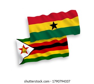 National vector fabric wave flags of Zimbabwe and Ghana isolated on white background. 1 to 2 proportion.