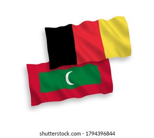 National vector fabric wave flags of Maldives and Belgium isolated on white background. 1 to 2 proportion.
