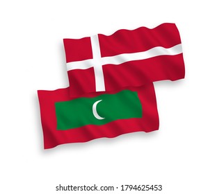 National vector fabric wave flags of Denmark and Maldives isolated on white background. 1 to 2 proportion.