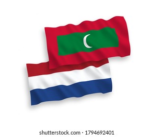 National vector fabric wave flags of Maldives and Netherlands isolated on white background. 1 to 2 proportion.