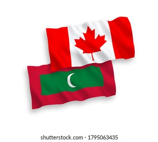 National vector fabric wave flags of Canada and Maldives isolated on white background. 1 to 2 proportion.