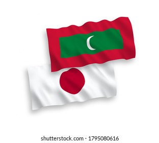 National vector fabric wave flags of Japan and Maldives isolated on white background. 1 to 2 proportion.