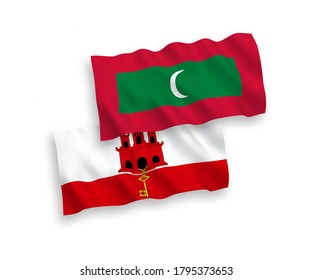 National vector fabric wave flags of Maldives and Gibraltar isolated on white background. 1 to 2 proportion.