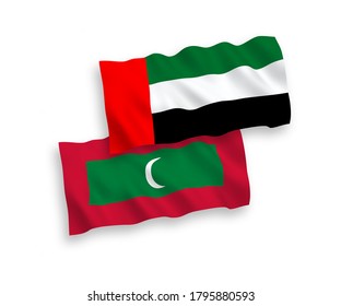 National vector fabric wave flags of Maldives and United Arab Emirates isolated on white background. 1 to 2 proportion.