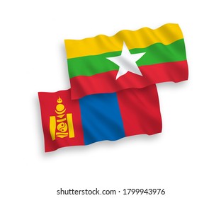 National vector fabric wave flags of Mongolia and Myanmar isolated on white background. 1 to 2 proportion.