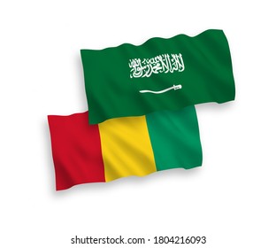 National vector fabric wave flags of Saudi Arabia and Guinea isolated on white background. 1 to 2 proportion.
