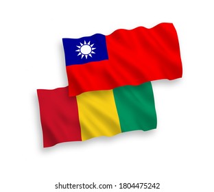 National vector fabric wave flags of Guinea and Taiwan isolated on white background. 1 to 2 proportion.