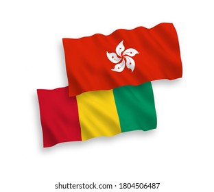 Nationale Vektor-Wellen-Flaggen von Guinea und Hongkong einzeln auf weißem Hintergrund. 1 bis 2 %.