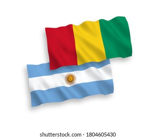 National vector fabric wave flags of Guinea and Argentina isolated on white background. 1 to 2 proportion.