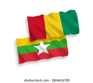 National vector fabric wave flags of Guinea and Myanmar isolated on white background. 1 to 2 proportion.