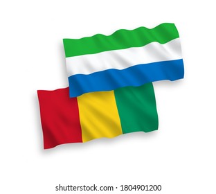 National vector fabric wave flags of Guinea and Sierra Leone isolated on white background. 1 to 2 proportion.
