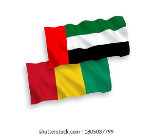 National vector fabric wave flags of Guinea and United Arab Emirates isolated on white background. 1 to 2 proportion.