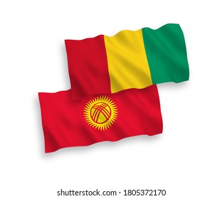 National vector fabric wave flags of Guinea and Kyrgyzstan isolated on white background. 1 to 2 proportion.