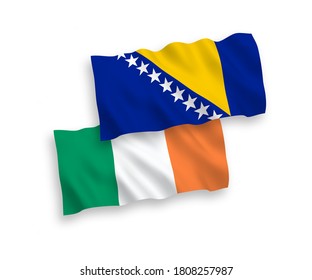 National vector fabric wave flags of Ireland and Bosnia and Herzegovina isolated on white background. 1 to 2 proportion.
