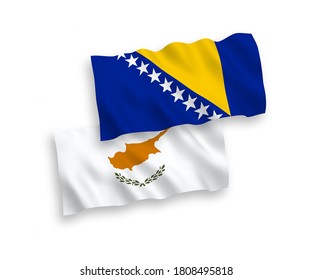 National vector fabric wave flags of Cyprus and Bosnia and Herzegovina isolated on white background. 1 to 2 proportion.
