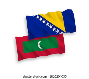 National vector fabric wave flags of Bosnia and Herzegovina and Maldives isolated on white background. 1 to 2 proportion.