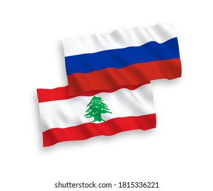National vector fabric wave flags of Lebanon and Russia isolated on white background. 1 to 2 proportion.