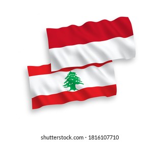 National vector fabric wave flags of Indonesia and Lebanon isolated on white background. 1 to 2 proportion.