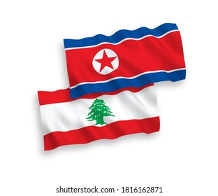 Banderas de olas de tela vectorial nacional de Corea del Norte y Líbano aisladas en fondo blanco. de 1 a 2.