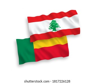 National vector fabric wave flags of Lebanon and Benin isolated on white background. 1 to 2 proportion.