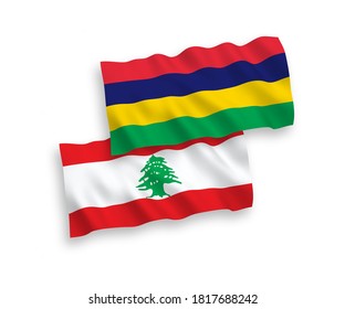 National vector fabric wave flags of Lebanon and Republic of Mauritius isolated on white background. 1 to 2 proportion.