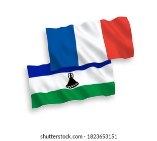 National vector fabric wave flags of France and Lesotho isolated on white background. 1 to 2 proportion.