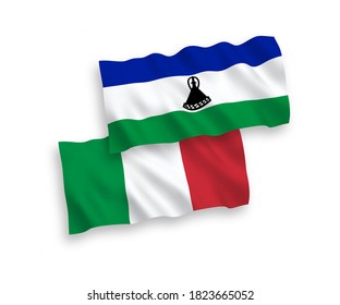 National vector fabric wave flags of Italy and Lesotho isolated on white background. 1 to 2 proportion.
